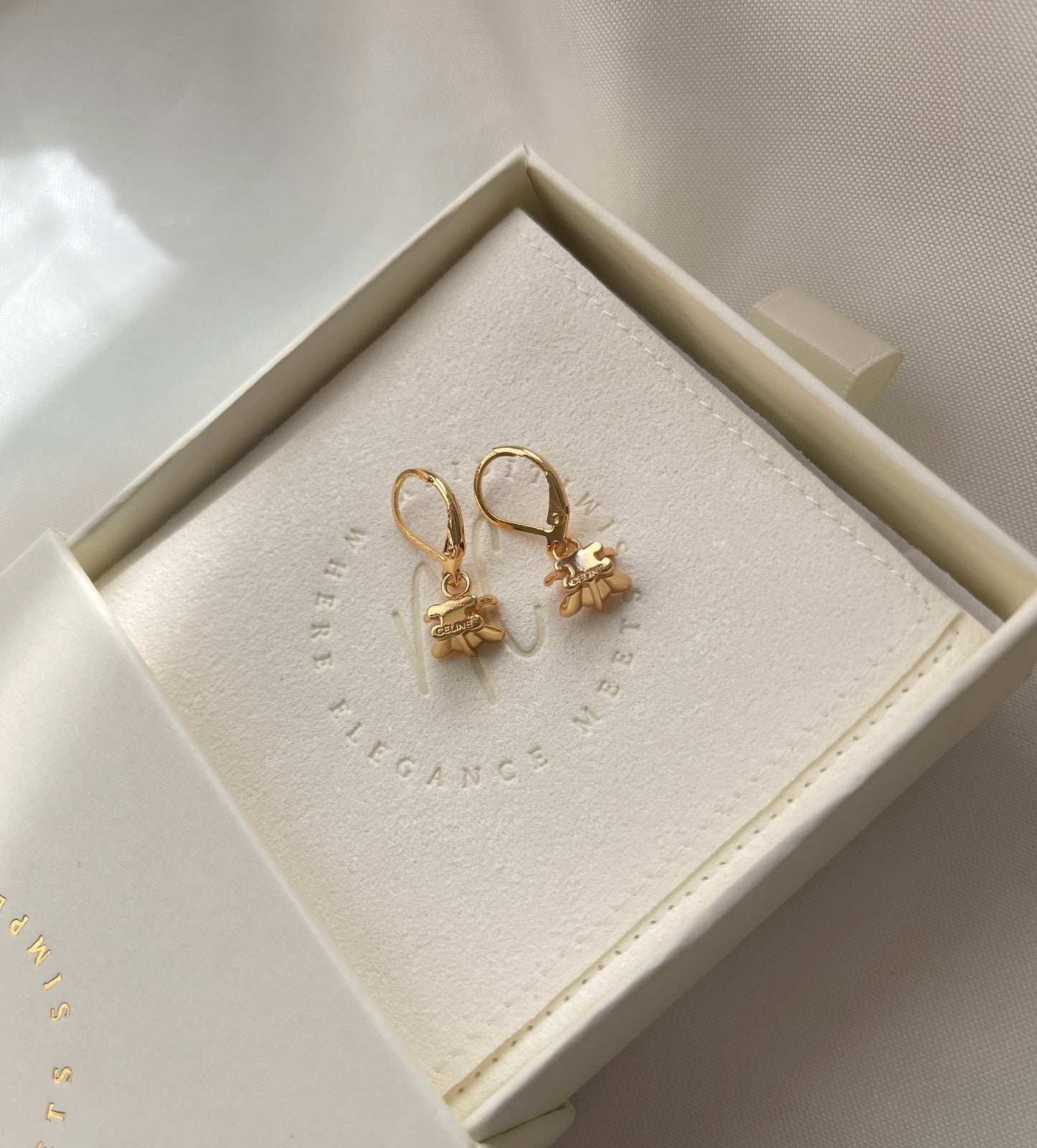 Triomphe drop gold earrings