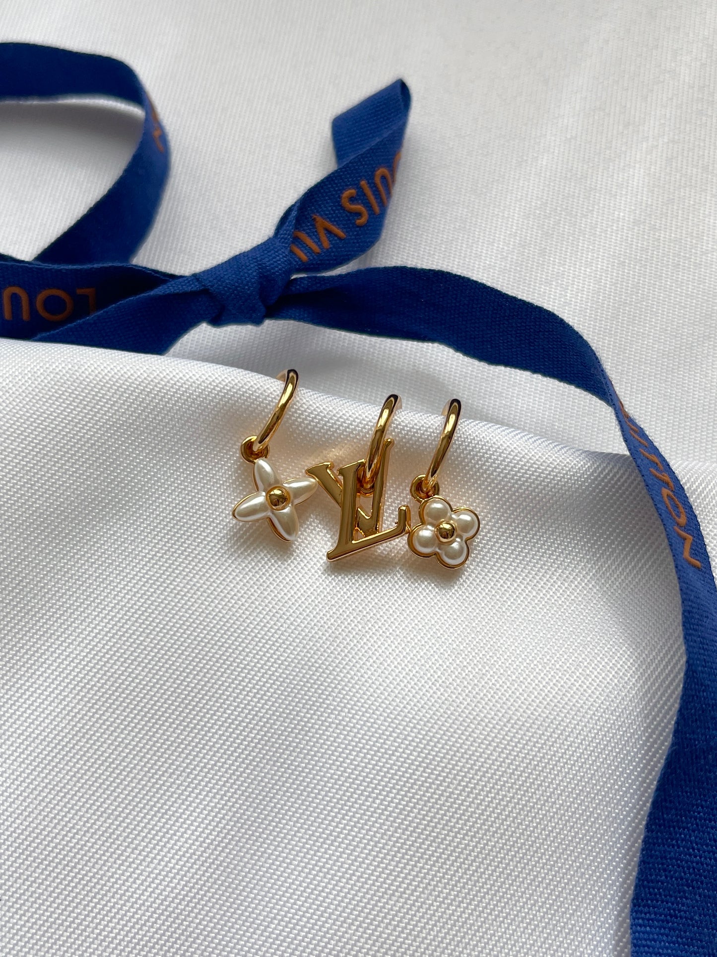 Lv floragram earrings