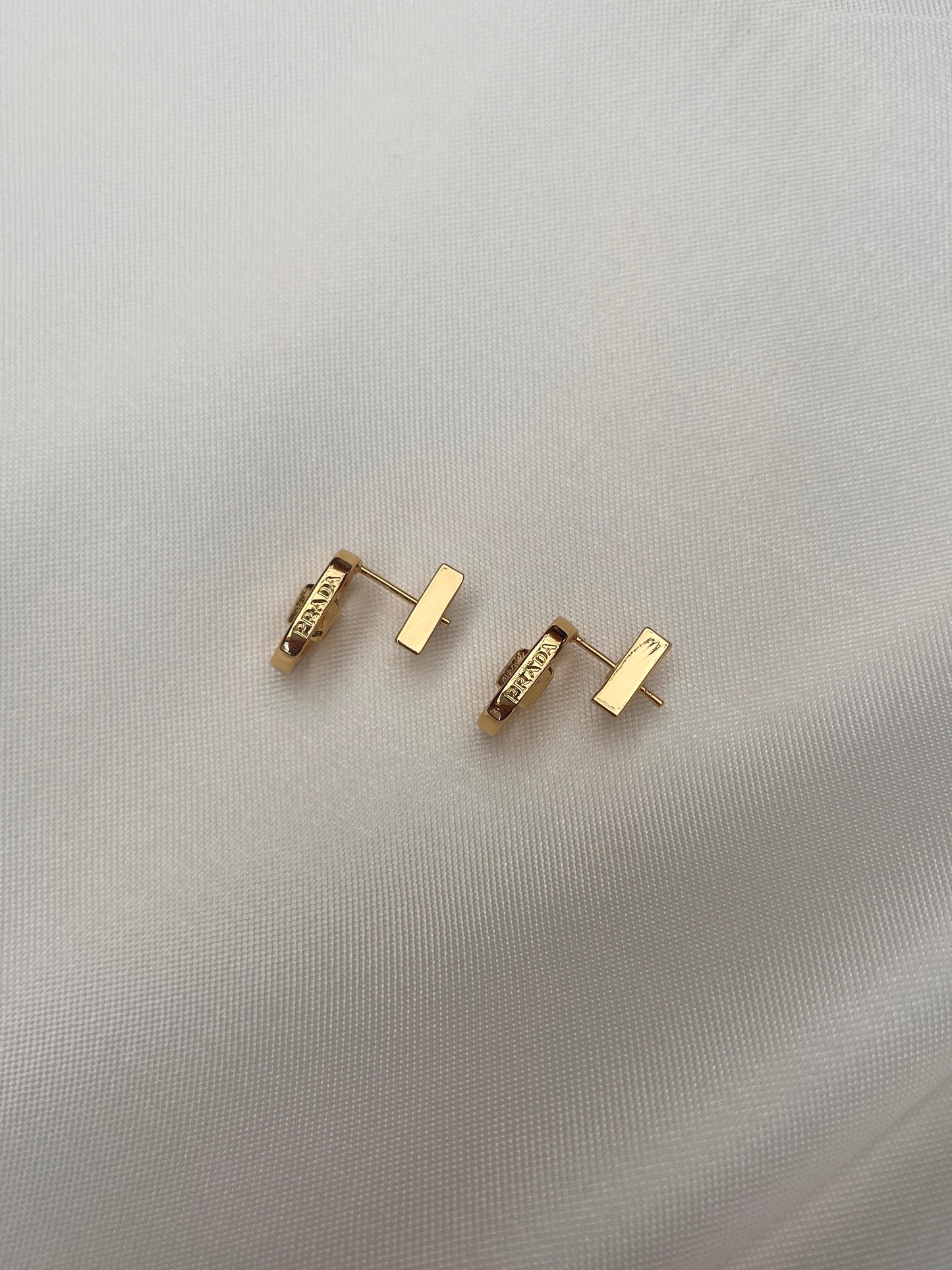 Prada metal gold earrings