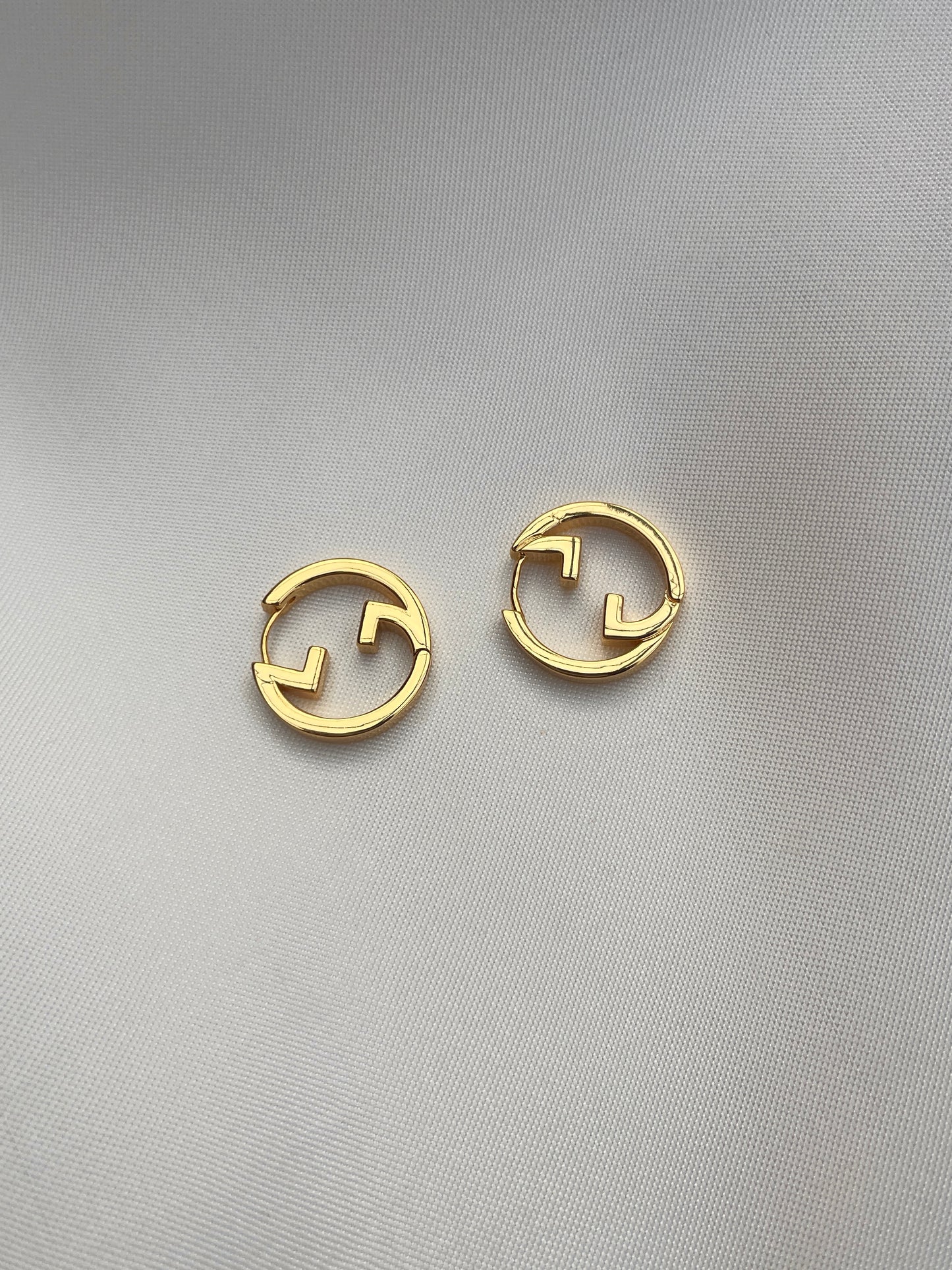 GG interlock small hoops earrings