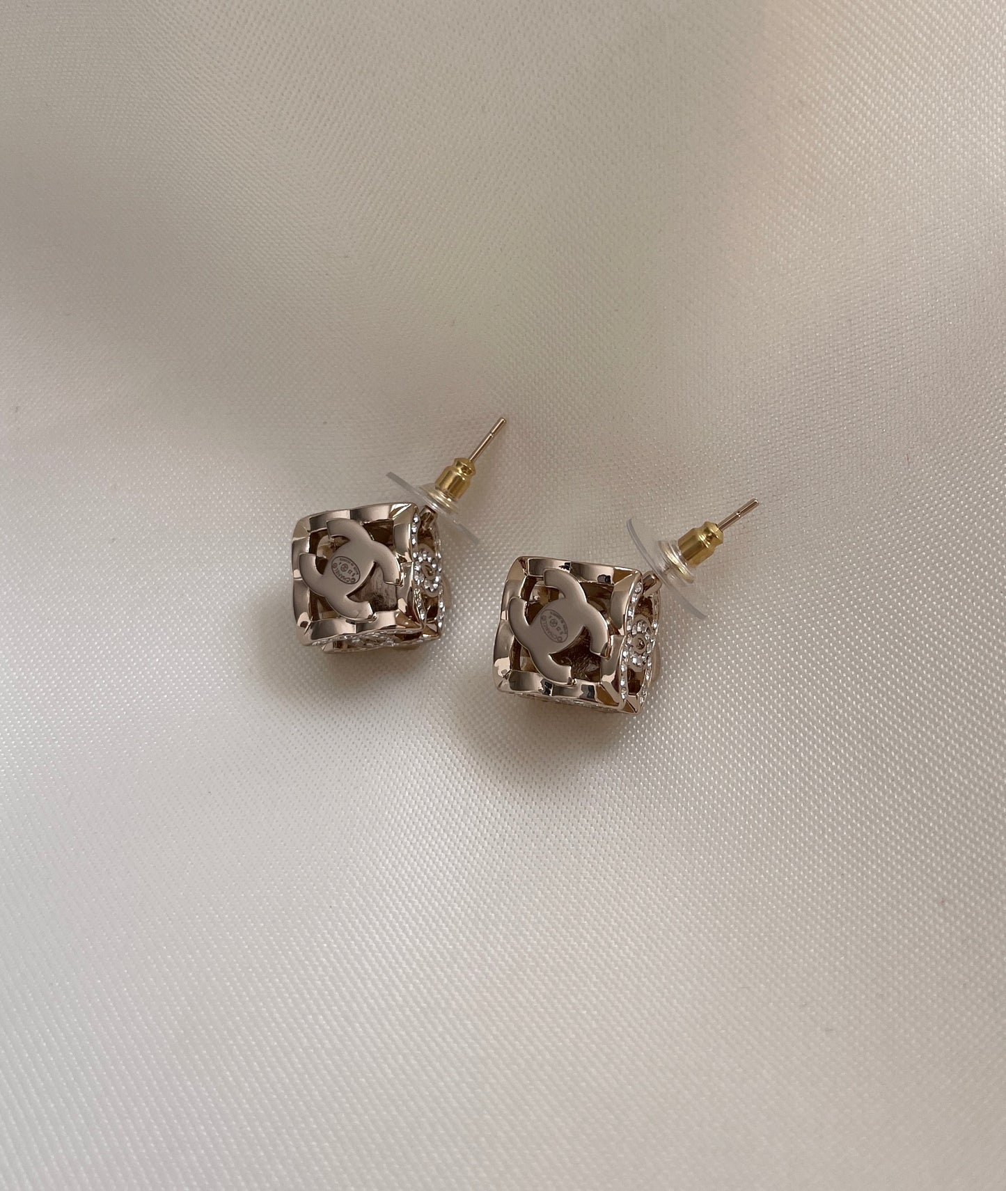 Ch stud earrings