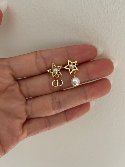 CD revolutions star earrings
