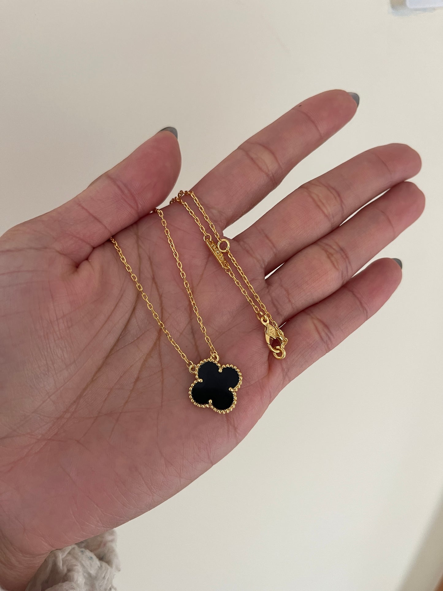 Vintage Alhambra gold and onyx pendant