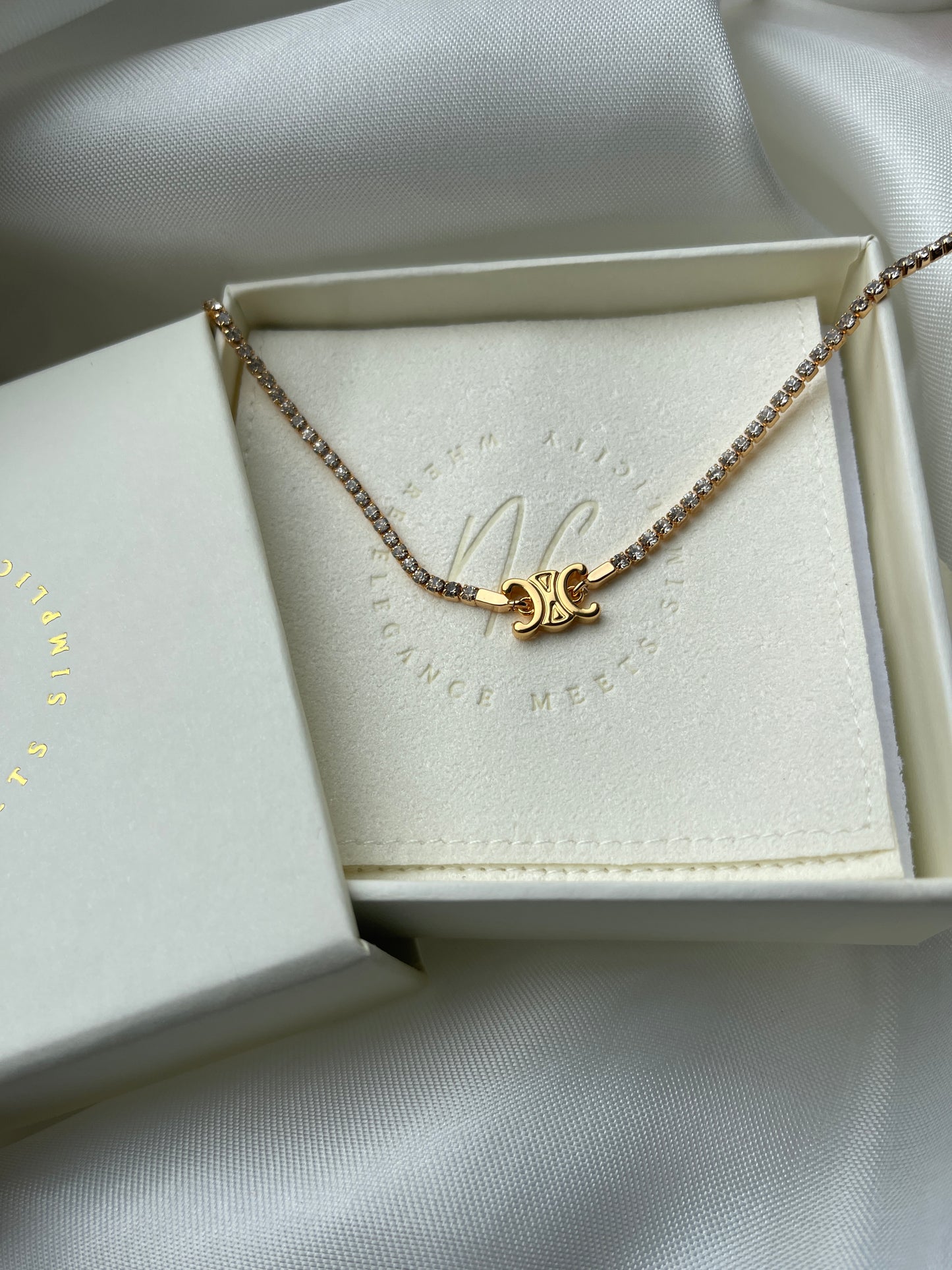 TRIOMPHE SPARKLE NECKLACE IN GOLD